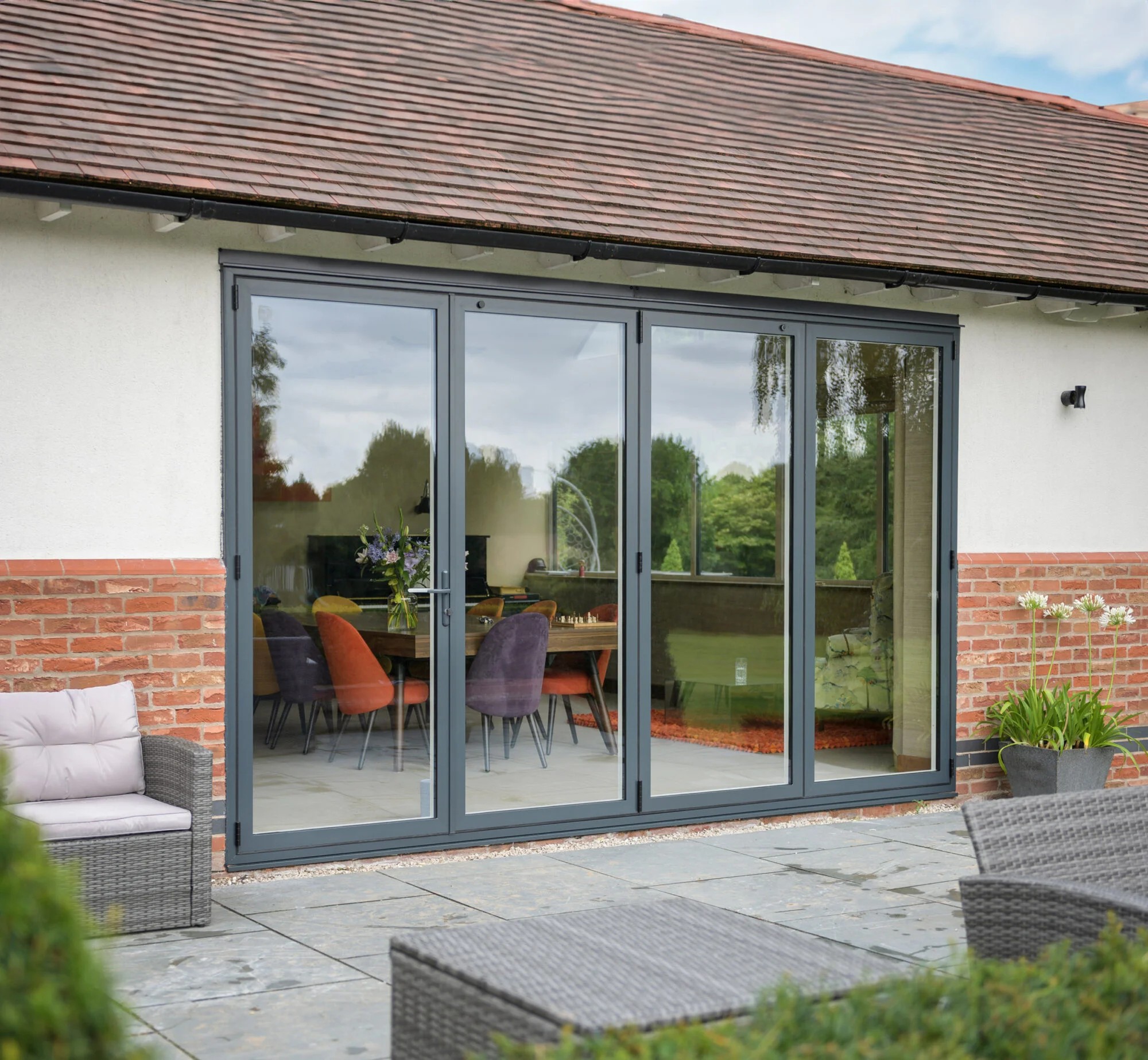 Grey aluminium bi-fold doors Chelmsford - Pinnacle Windows